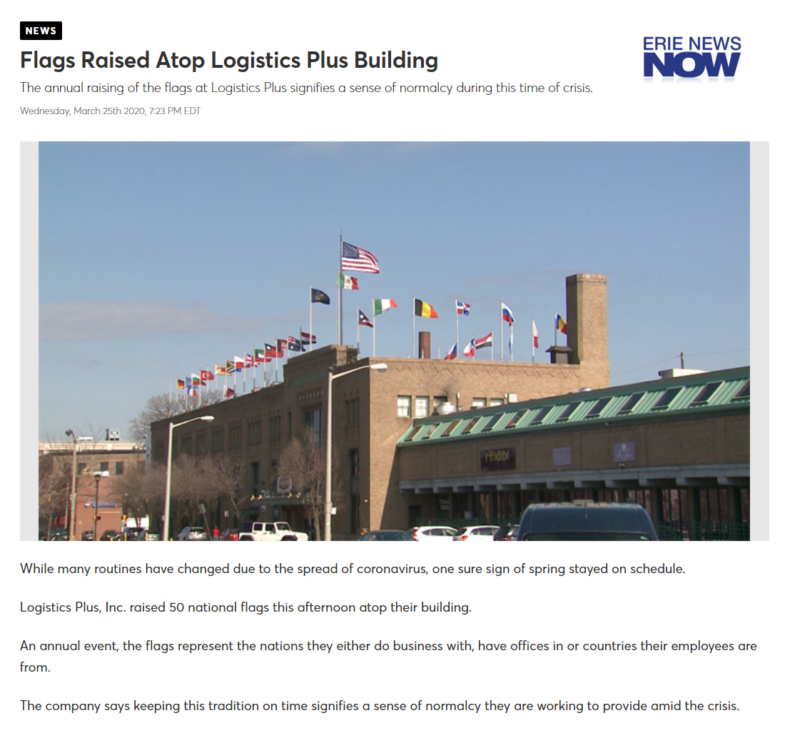 Flags Raised Atop Logistics Plus Building
