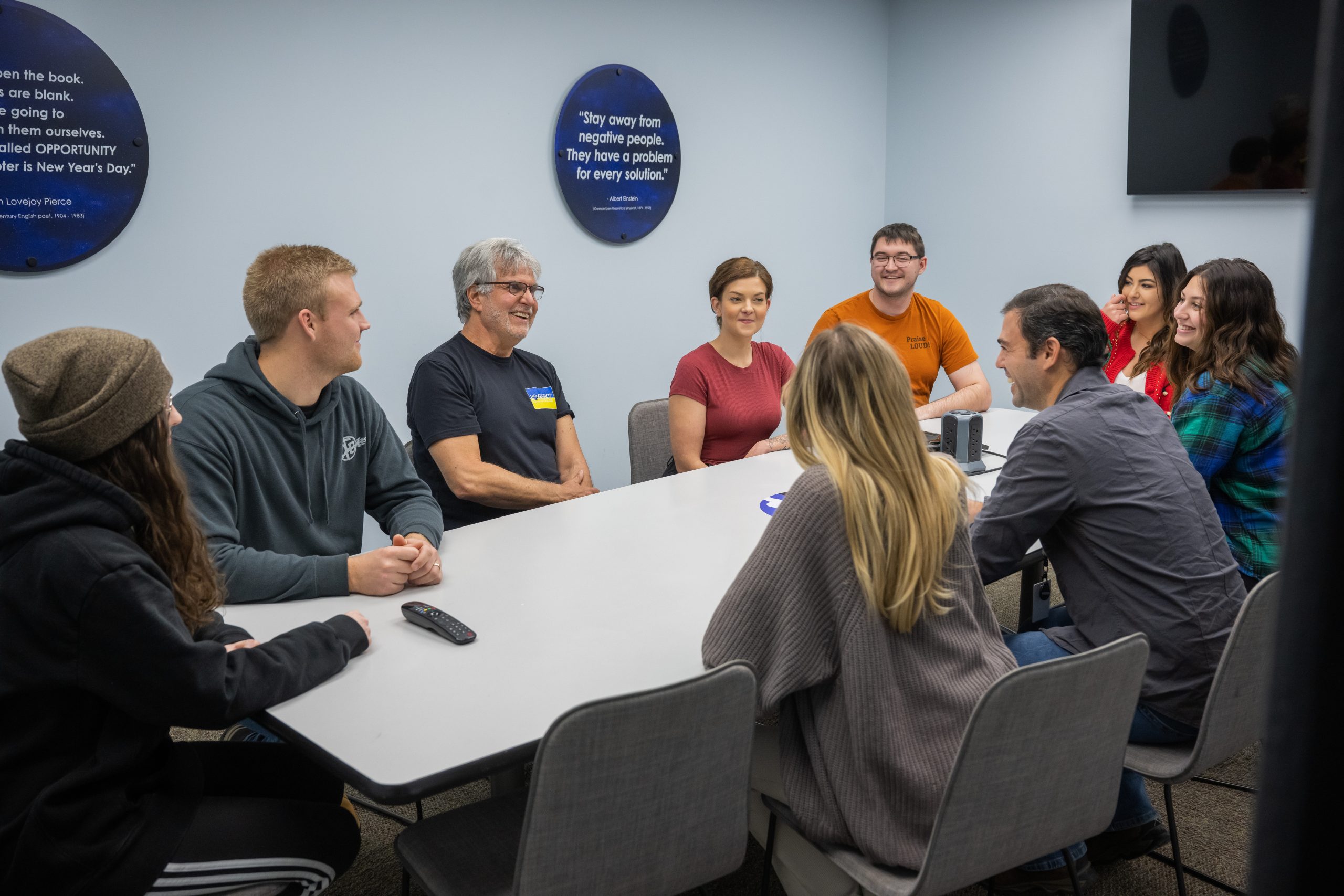 Logistics Plus CEO, Jim Berlin, meets with a group of employees